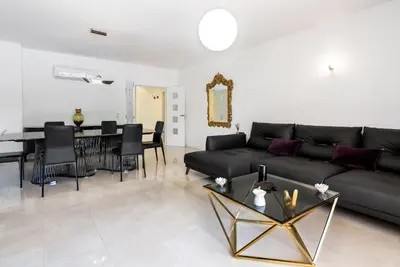 a cobblestone street in front of a building at Love Nest Algarve Edition vilamoura in Vilamoura