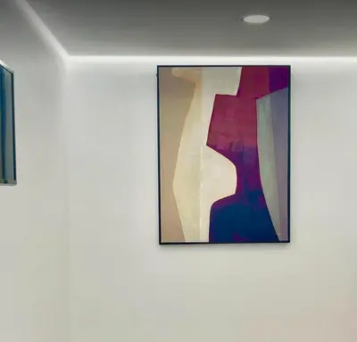 a painting on a wall in a room at Pontinha Exclusive Apartment in Faro