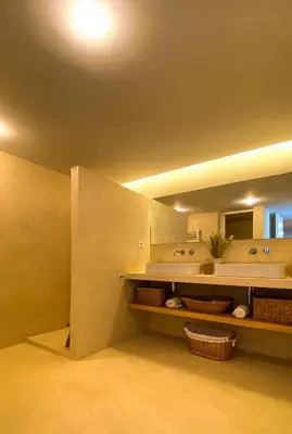 a bathroom with a sink and a mirror at YES! Incrível Vista Piscina T2 HsR Vilamarina in Vilamoura