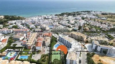 an aerial view of a city with the ocean at #107 T1 Vista das Ondas by Home Holidays in Albufeira