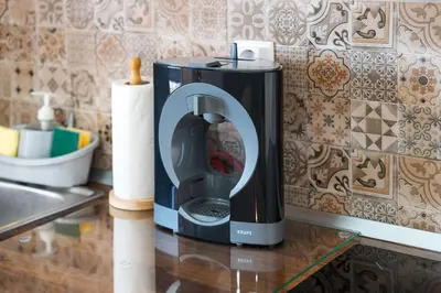 a coffee maker sitting on top of a counter at My Place @ Faro Skyline in Faro