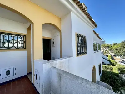 a balcony of a house with a view at Quarteira Classic 1 With Pool by Homing in Quarteira