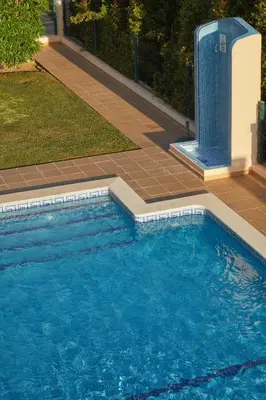 a painting above two beds with pillows on them at Villa Monte das Oliveiras with Private Pool in Albufeira