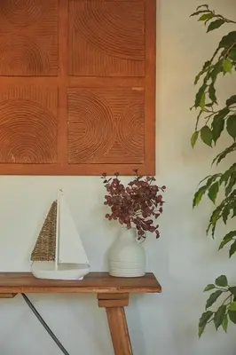 a mirror on top of a wooden table at Villa Monte das Oliveiras with Private Pool in Albufeira
