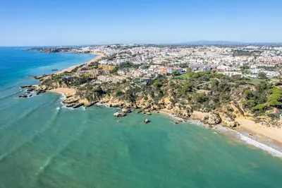 an aerial view of a beach and the ocean at Villa Dorado by Algarve Vacation in Albufeira