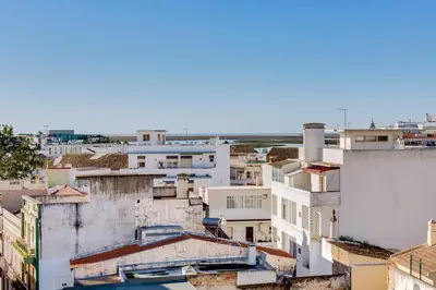 an aerial view of a city with buildings at À dos Reis in Faro