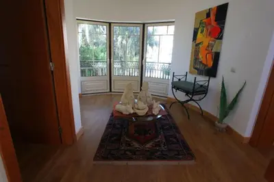 a living room with a rug and a room with a window at Amazing Portuguese Villa Villa Heroine 6 Bedrooms Stunning Position in Albufeira