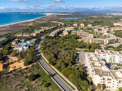 an aerial view of a city and the ocean at Salgados 1 Bedroom Apartment - 500m from the Beach in Guia