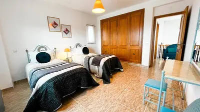 a room with two beds in a room at Villa Pedro by Sunny Deluxe in Albufeira