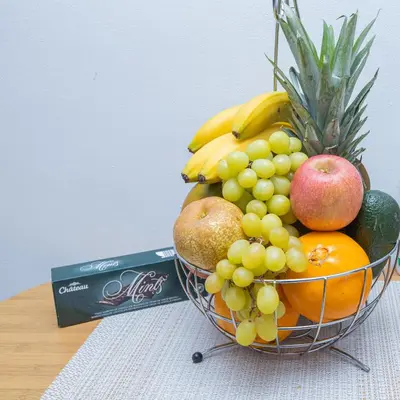 a bowl of fruit sitting on top of a table at Holiday Albufeira in Albufeira