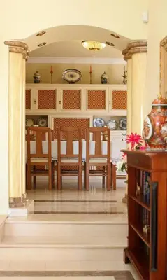 a dining room with a table and chairs at Villa Juniper fenced pool spacious house in Albufeira