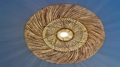 a close up of a wavy metal ceiling light at Adam's Place (Garça Real)CD242 - Clever Details, Sleeps 4 people, Wifi, Garage in Vilamoura