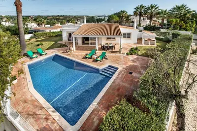 an overhead view of a swimming pool in front of a house at Celina by Algarve Villa Holidays in Guia