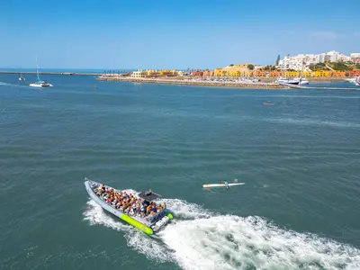 a group of people in a boat in the water at Villa Laura by Algarve Vacation in Albufeira