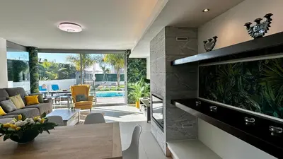 a living room with a couch and a table at Moon by Check-in Portugal in Albufeira