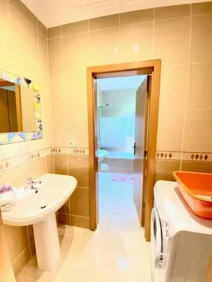 a bathroom with a sink and a toilet and a shower at Flamingos Apartment with 2 swimming pool com check in e check out ao domingo em julho e agosto in Albufeira