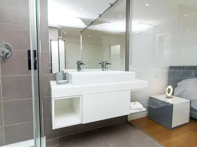 a bathroom with a white sink and a shower at Harmony 4B House by Stay ici Algarve Holiday Rental in Albufeira