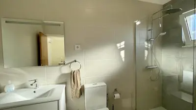 a bathroom with a toilet and a sink and a shower at Margarida by Check-in Portugal in Albufeira