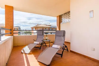 a building with a sign on the side of it at Corcovada, Sunny and Bright T1 with Large Terrace, Albufeira in Albufeira