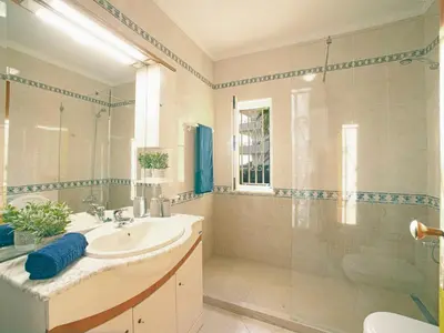 a bathroom with a sink and a shower at Villa Inês by Interhome in Galé