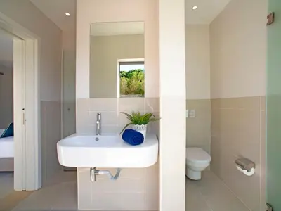 a bathroom with a sink and a shower at Apartment Pine Hills Esmeralda by Interhome in Vilamoura