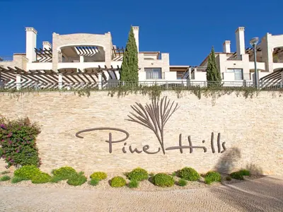 a view of a beach with rocks and the ocean at Apartment Pine Hills Rubi by Interhome in Vilamoura