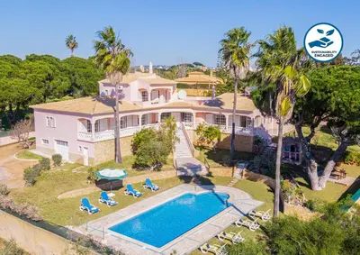 an aerial view of a large house with a swimming pool at Villa Mar & Sol by Algarve Vacation in Albufeira