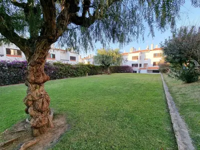 a living room with a couch and a flat screen tv at #109 Zélio House by Home Holidays in Albufeira