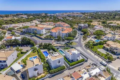 an aerial view of a city with houses at Villa Casa Morim by Villa Plus in Olhos de Água