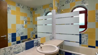 a bathroom with a sink and a toilet at Marina by Check-in Portugal in Albufeira