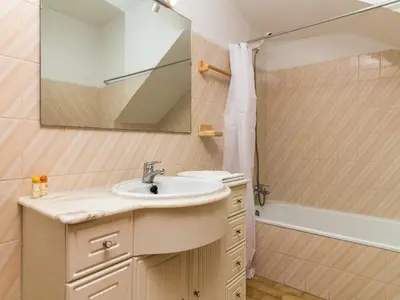 a bathroom with a sink and a shower at Villa Dogueno by Stay ici Algarve Holiday Rental in Albufeira