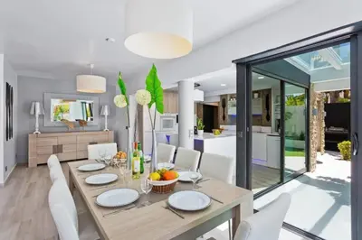 a dining room and kitchen with a table and chairs at Villa Stefy by Bedzy in Galé