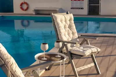 a view of the side of a building with a patio at Apartamento Sunset on the Sea in Albufeira