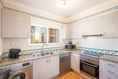 a kitchen with a sink and a dishwasher at Beachsun Gale - beautiful villa close to beach in Galé