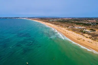 an aerial view of a beach and the ocean at Villa Farol by OCvillas in Galé