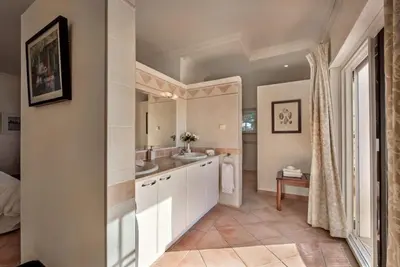 a bathroom with a sink and a toilet at Villa Zarana fantastic house in Salinas in Faro