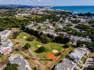 an aerial view of a house with a golf course at #120 T3 Espaçoso em Albufeira by Home Holidays in Albufeira