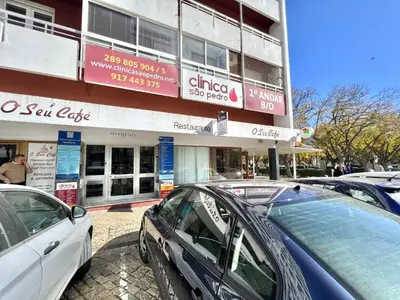 a group of cars parked in front of a building at Vista by the Nest - City Center HD PROPERTIES in Faro