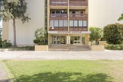 a building with a staircase in front of it at CORTEZ - Vilamoura in Vilamoura