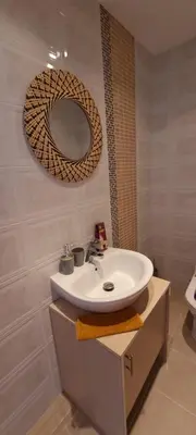 a bathroom with a sink and a mirror on the wall at Star Dreams Albufeira in Albufeira