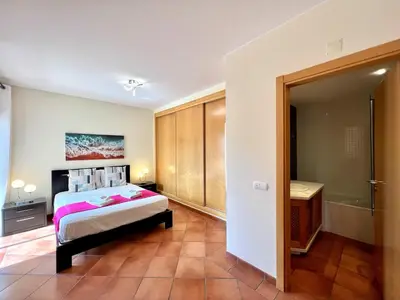 a view of a beach with buildings in the background at Albufeira Experience With Pool by Homing in Albufeira