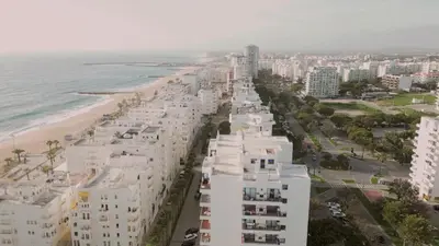 an aerial view of a city with white buildings at Divine Quarteira Sea View By JG Apartments in Quarteira