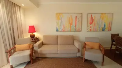 a living room with a couch and two chairs at Your house at Falésia in Albufeira