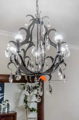 a chandelier is hanging from a ceiling at #032 T2 Idalia by Home Holidays in Albufeira