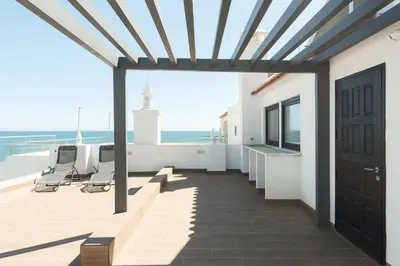 a balcony with a view of the ocean at Miral Beachside 3 - by HD Properties in Albufeira