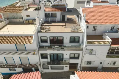 an overhead view of white buildings with red roofs at Miral Beachside 4 - by HD Properties in Albufeira
