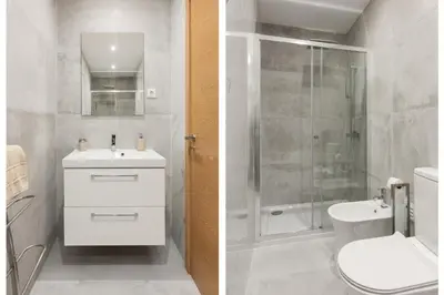a bathroom with a shower and a sink and a toilet at Miral Beachside 5 - by HD Properties in Albufeira