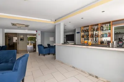 a billiard room with a pool table and some tables at Emeralds Albufeira by DK Stays in Albufeira