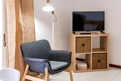 two beds sitting next to each other in a room at Melvin Jones St. 2bedroom apartment in Quarteira