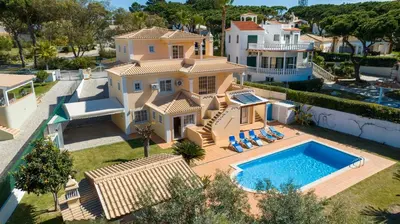 an aerial view of a house with a swimming pool at Amora Classic Villa in Vilamoura
